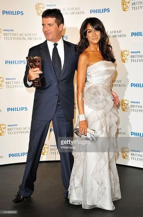  Simon Cowell and Jackie St. Clair at BAFTA Television Awards 2010, Ralph & Russo Gown
